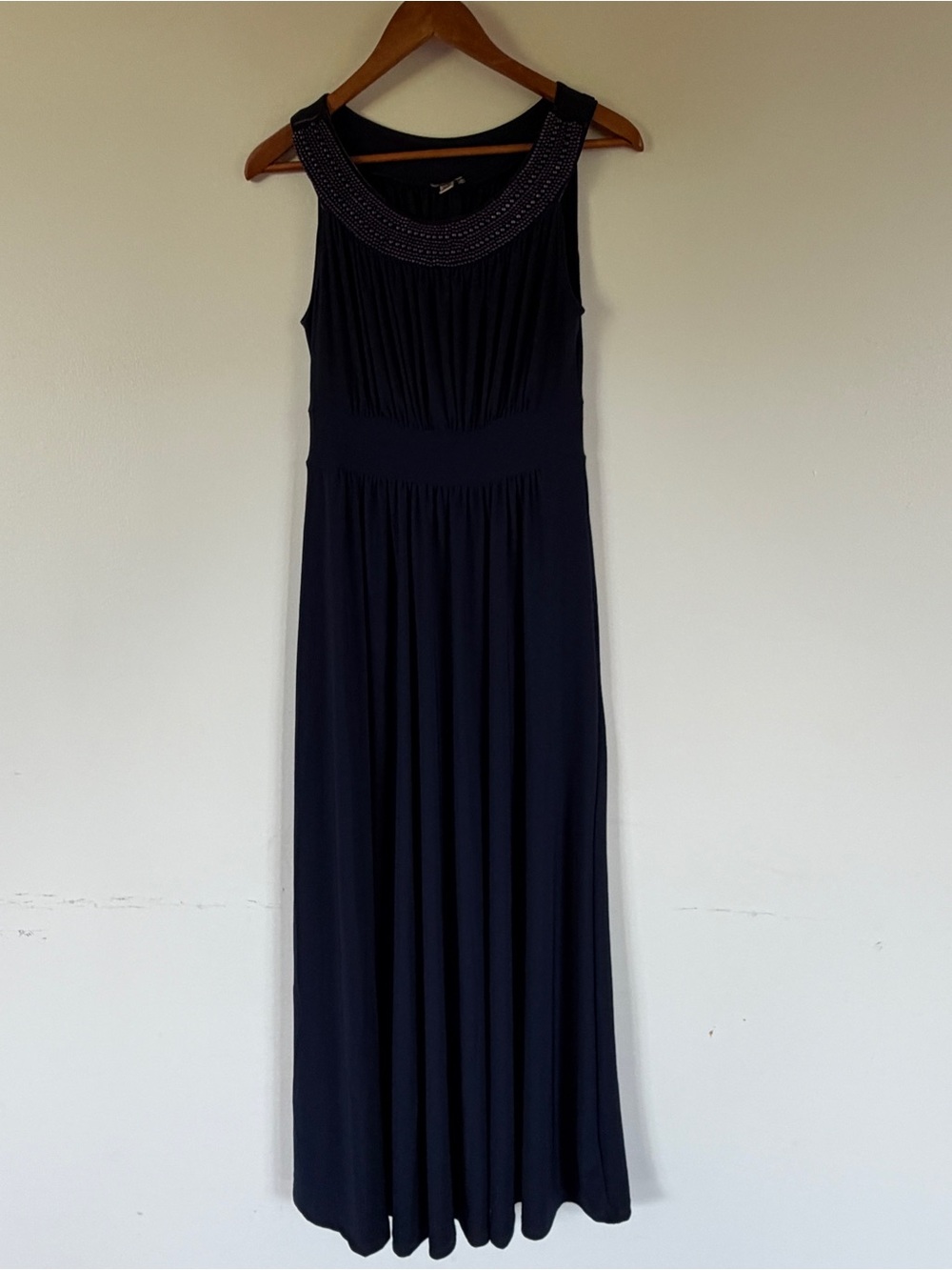 Haani Long Navy Blue Maxi Dress
Size S Beaded Neckline
Sleeveless Stretch